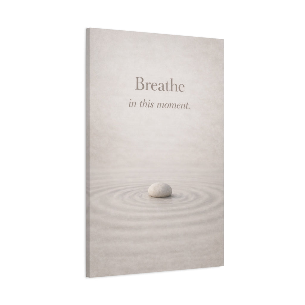 Zen mindfulness canvas wall art with a minimalistic design of a stone in water and the text 'Breathe in this moment' on a white background.
