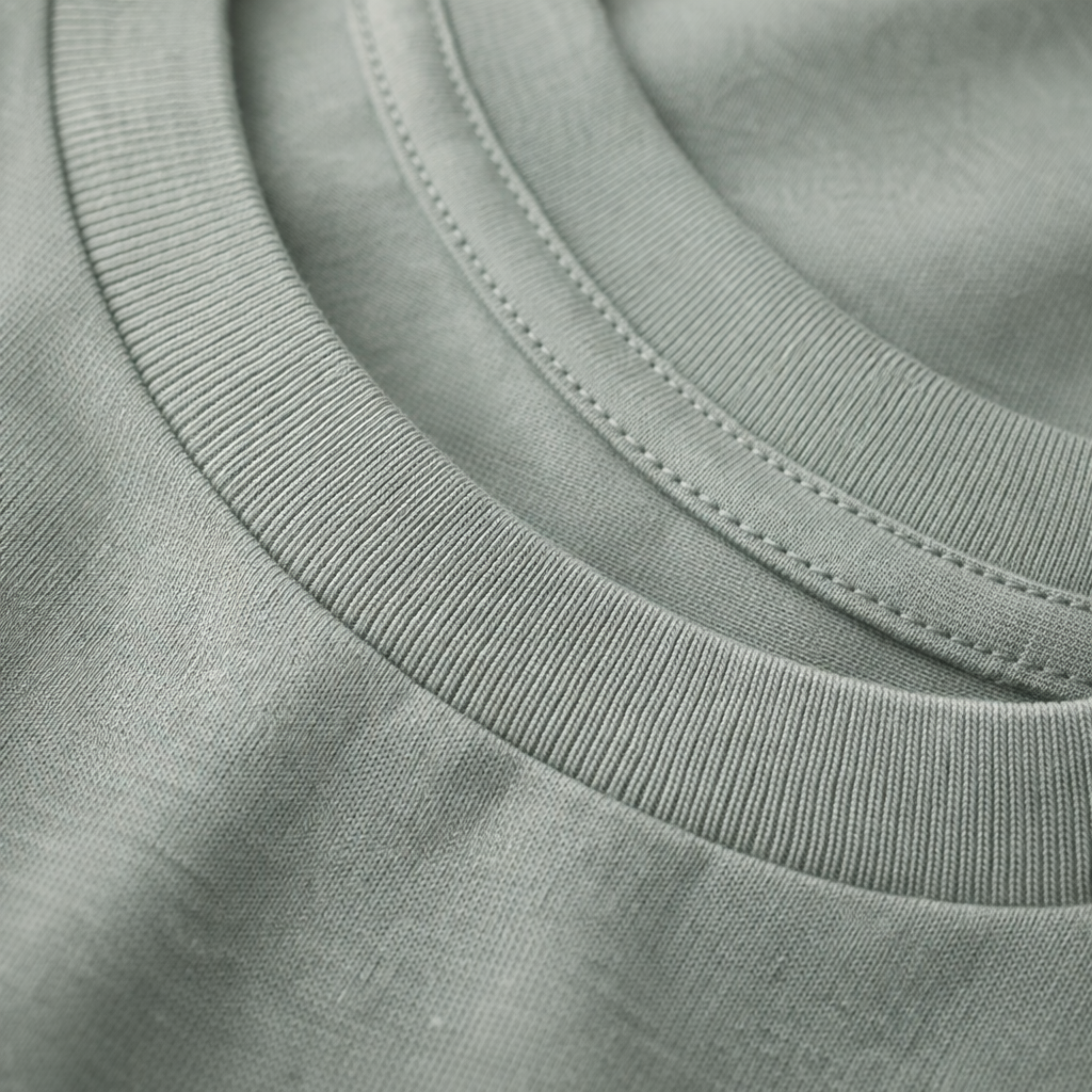 Close-up of a safe green collar with stitching detail.