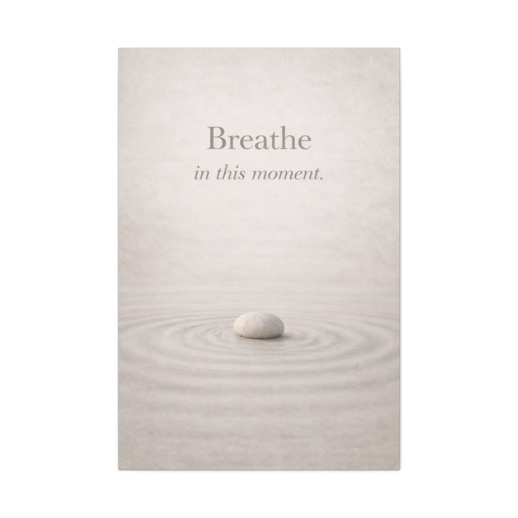Rounded stone on water with 'Breathe in this moment' text on a light gray background. Zen mindfulness canvas wall art