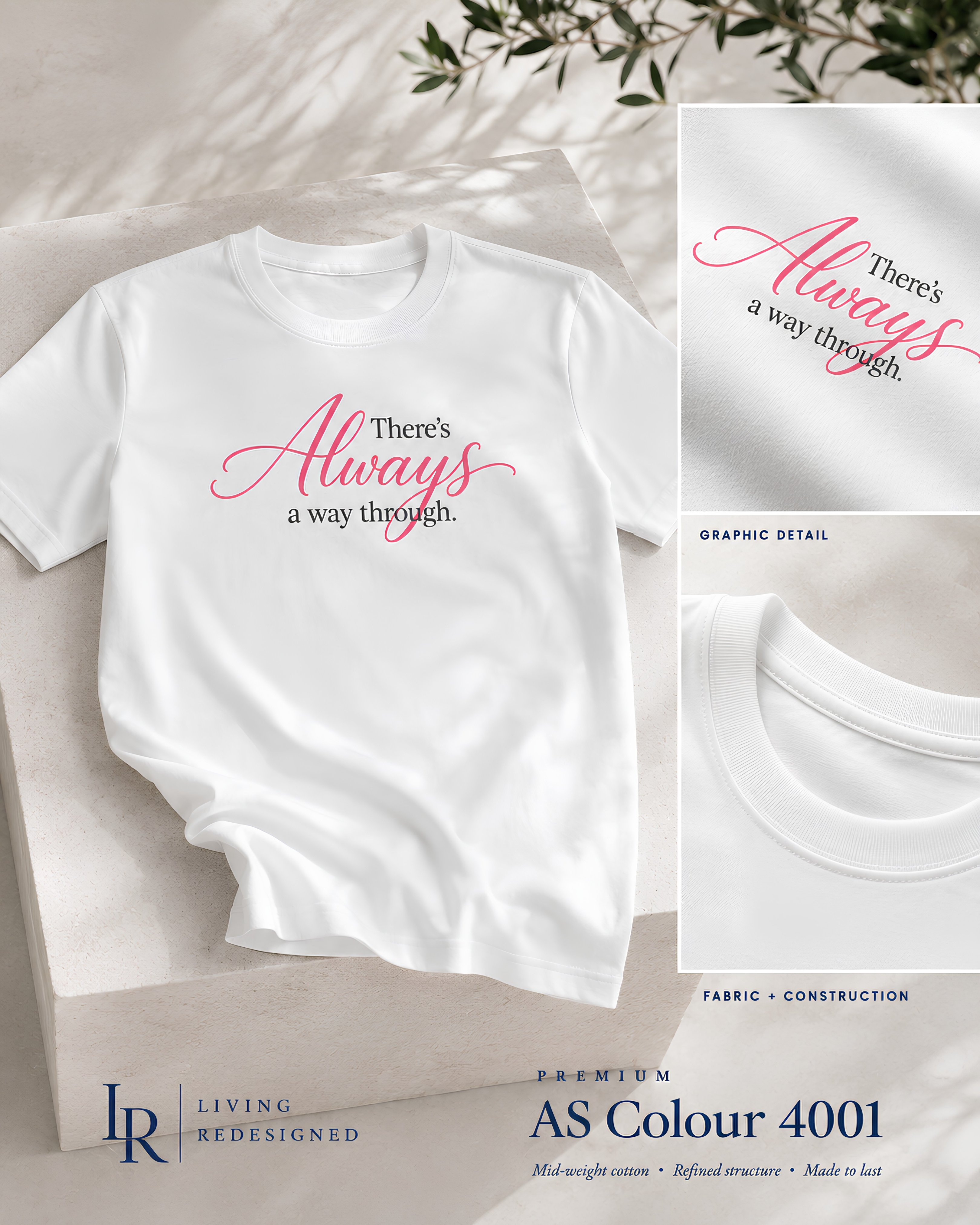 Women’s inspirational graphic tee detail showing feminine pink script, dark graphite typography, white cotton fabric, and crew neckline. "Always a way through" tee.