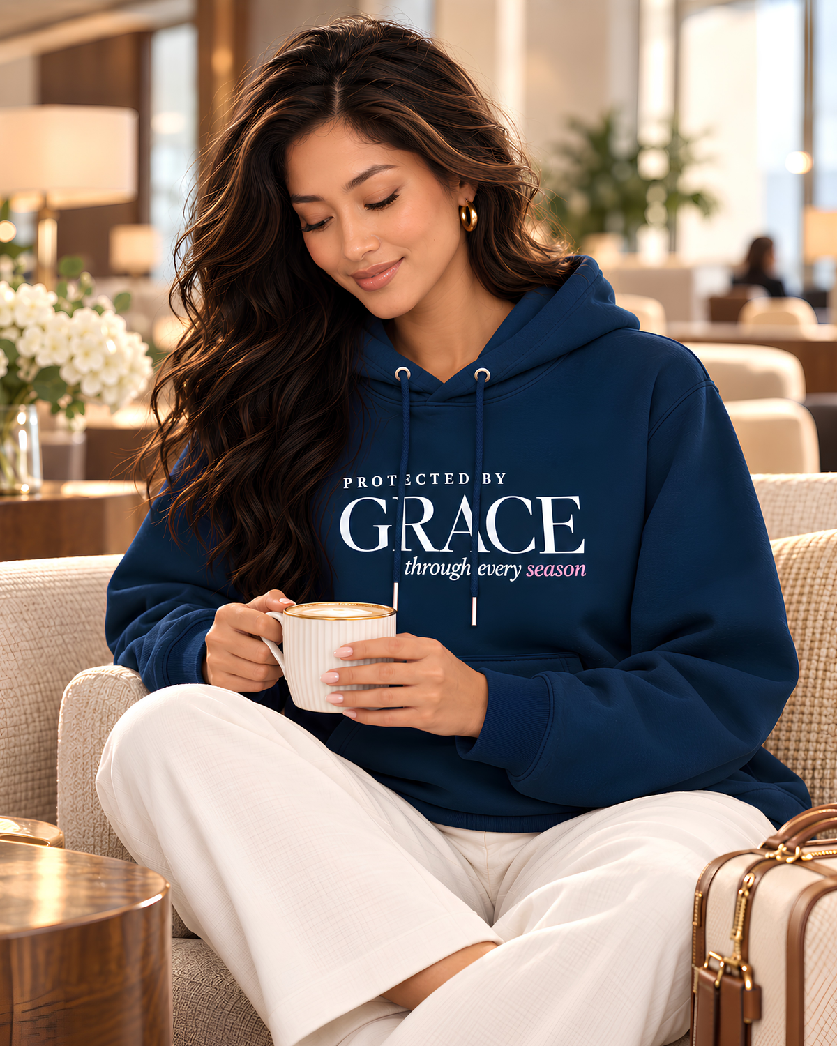 Protected by Grace Christian hoodie styled as a comfortable airport travel outfit.