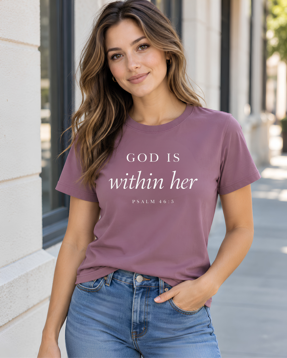 Mauve God Is Within Her Psalm 46:5 Bible verse T-shirt with refined faith-inspired lettering.