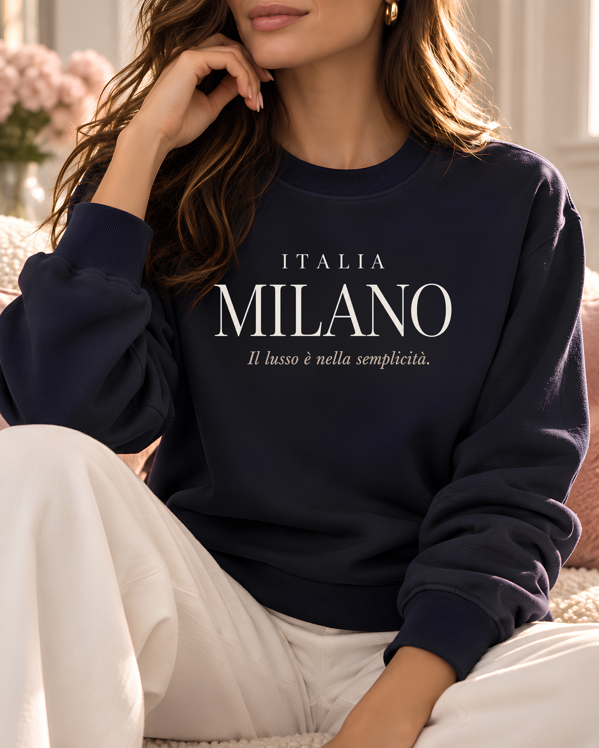 Living Redesigned women’s graphic sweatshirt styled in a refined fashion setting.