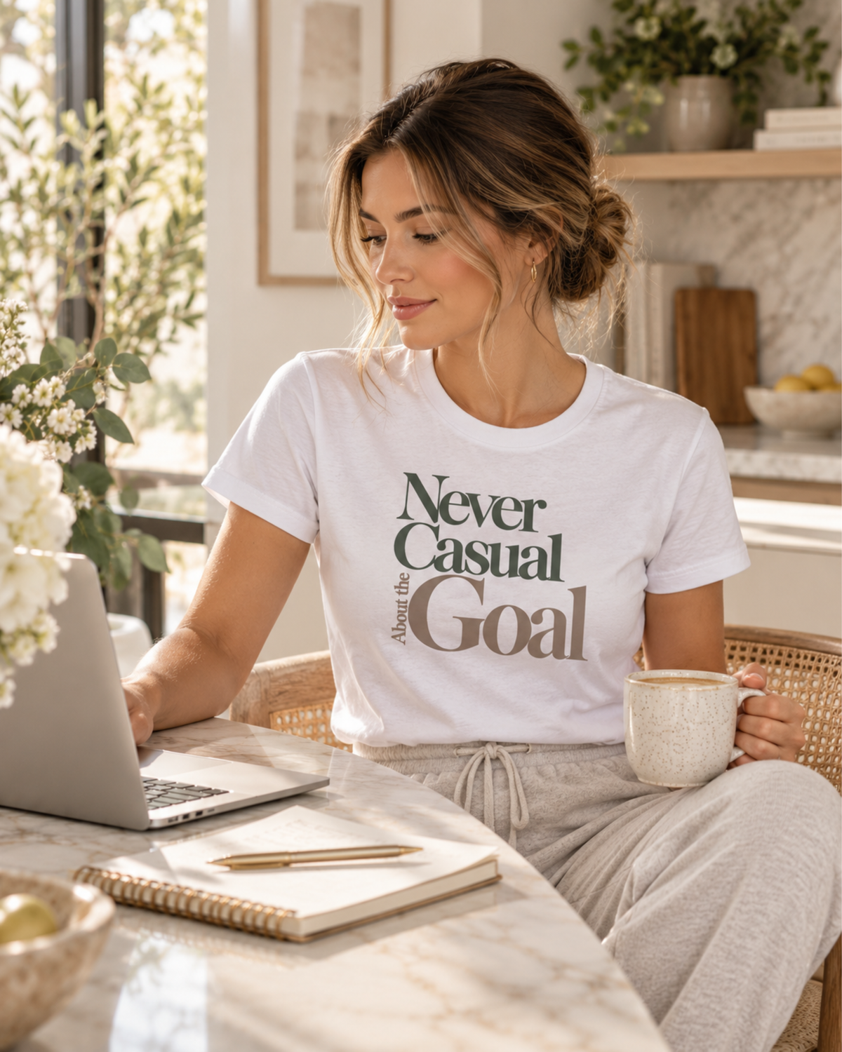 White Never Casual About the Goal women's graphic tee styled with relaxed loungewear for an everyday outfit.