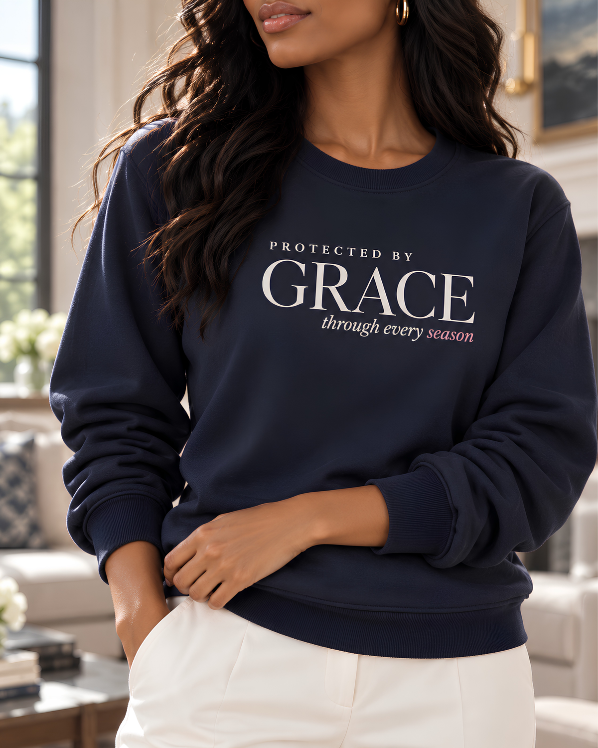 Protected by Grace Christian crewneck sweatshirt for women with understated faith-inspired front lettering.
